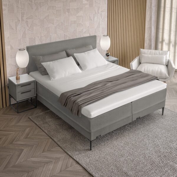 Grijze boxspring met nachtkastjes
